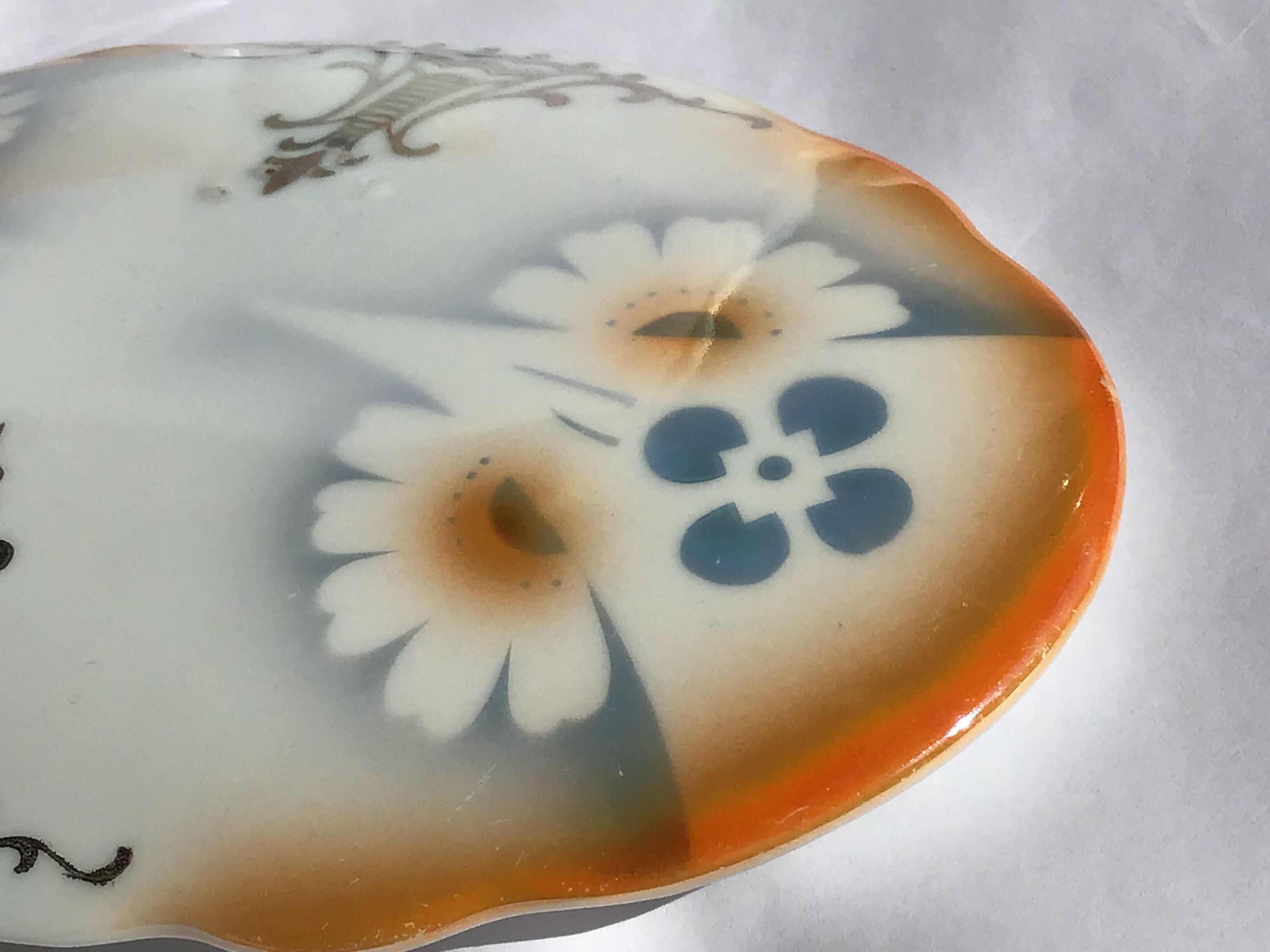 Decorated oval porcelain candy