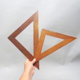 Two school brackets in natural wood