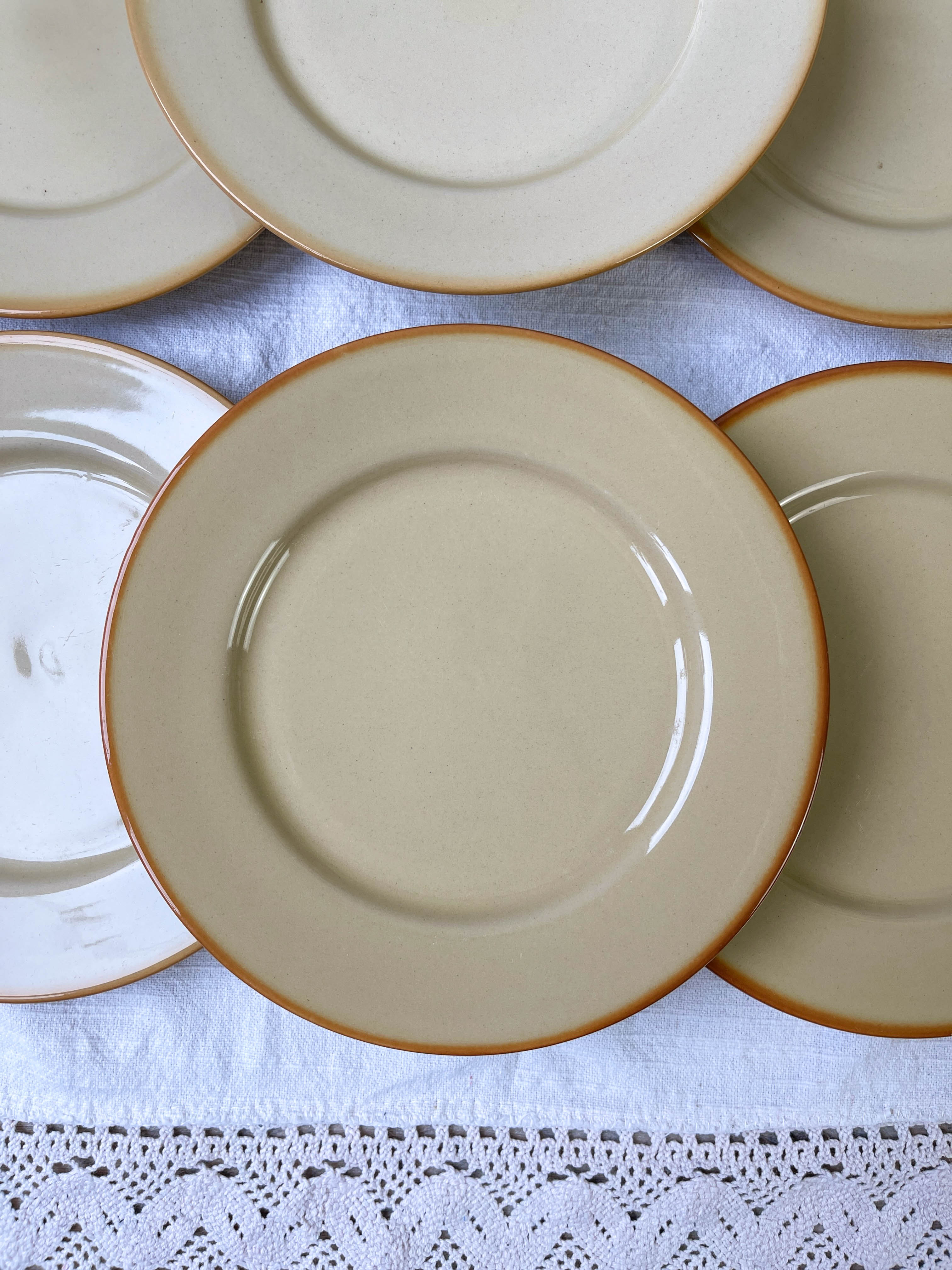 9 mid-century beige Tulowice stoneware plates