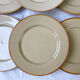 9 mid-century beige Tulowice stoneware plates