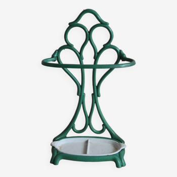 Old green cast iron umbrella stand