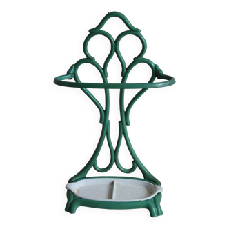 Old green cast iron umbrella stand