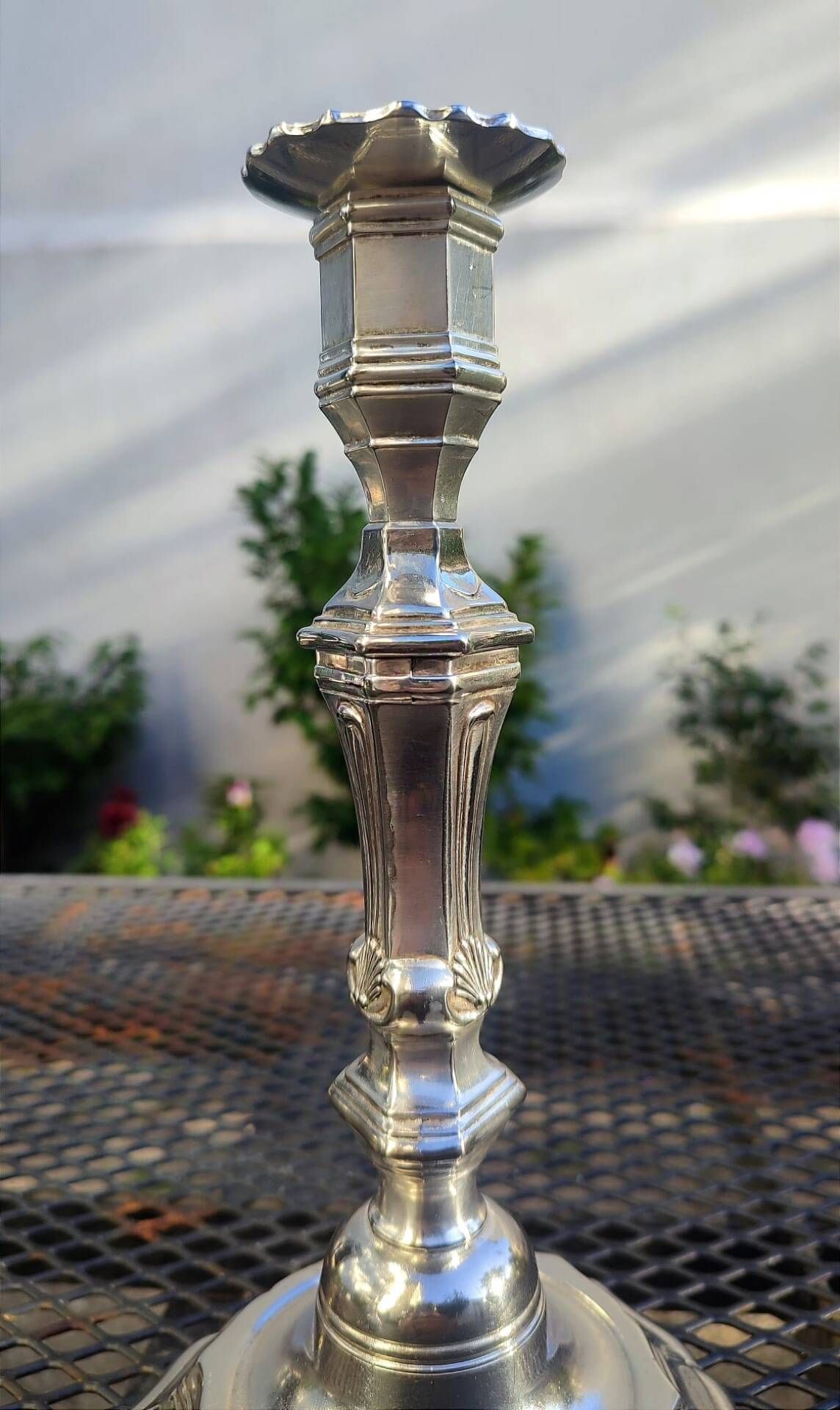 Magnificent pair of silver candlesticks.