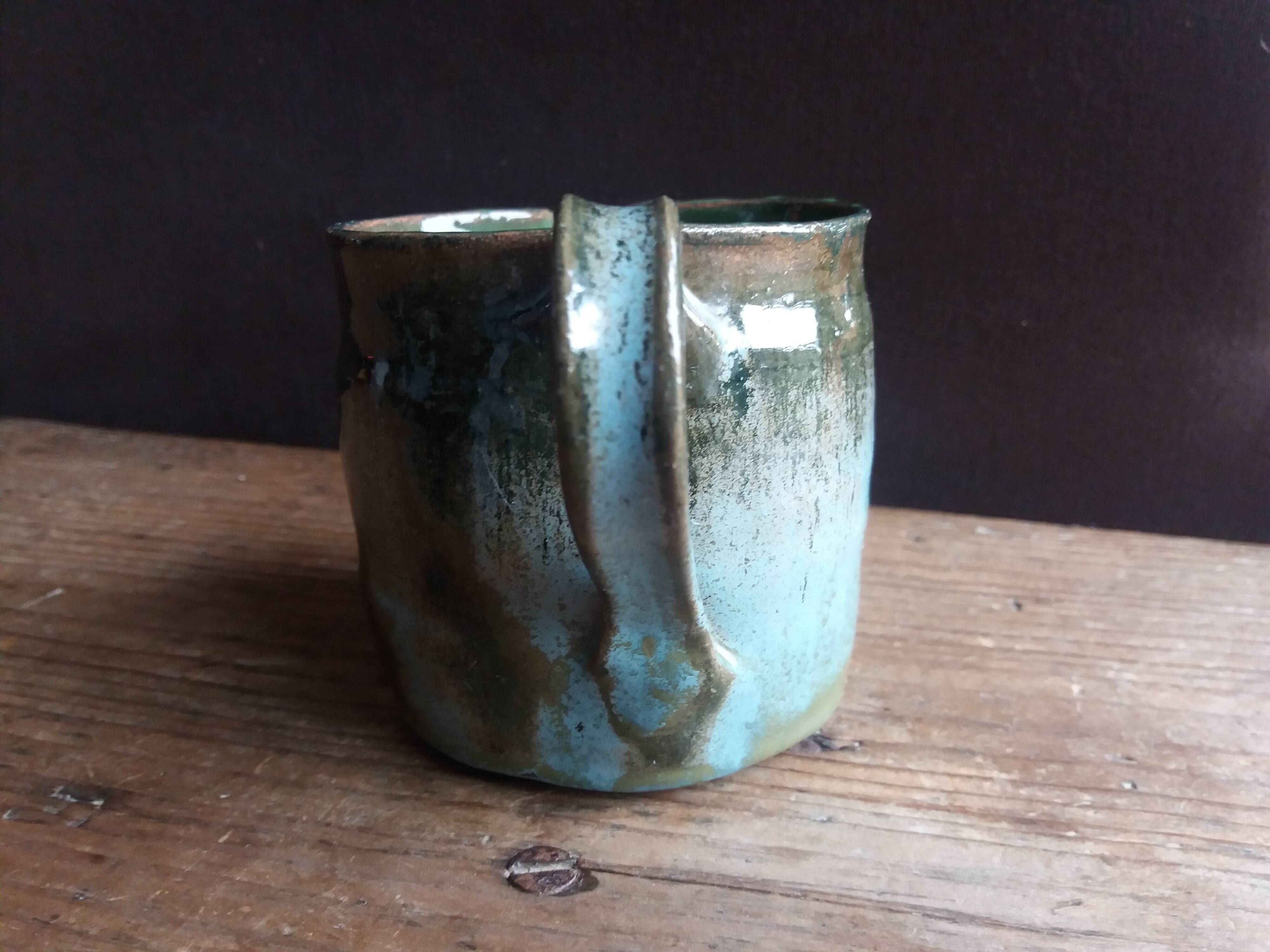 Handcrafted enameled terracotta pitcher signed