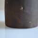 Ceramic bottle vase with a fish signature to be identified.