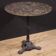 20th-century French iron bistro table with a marble top.