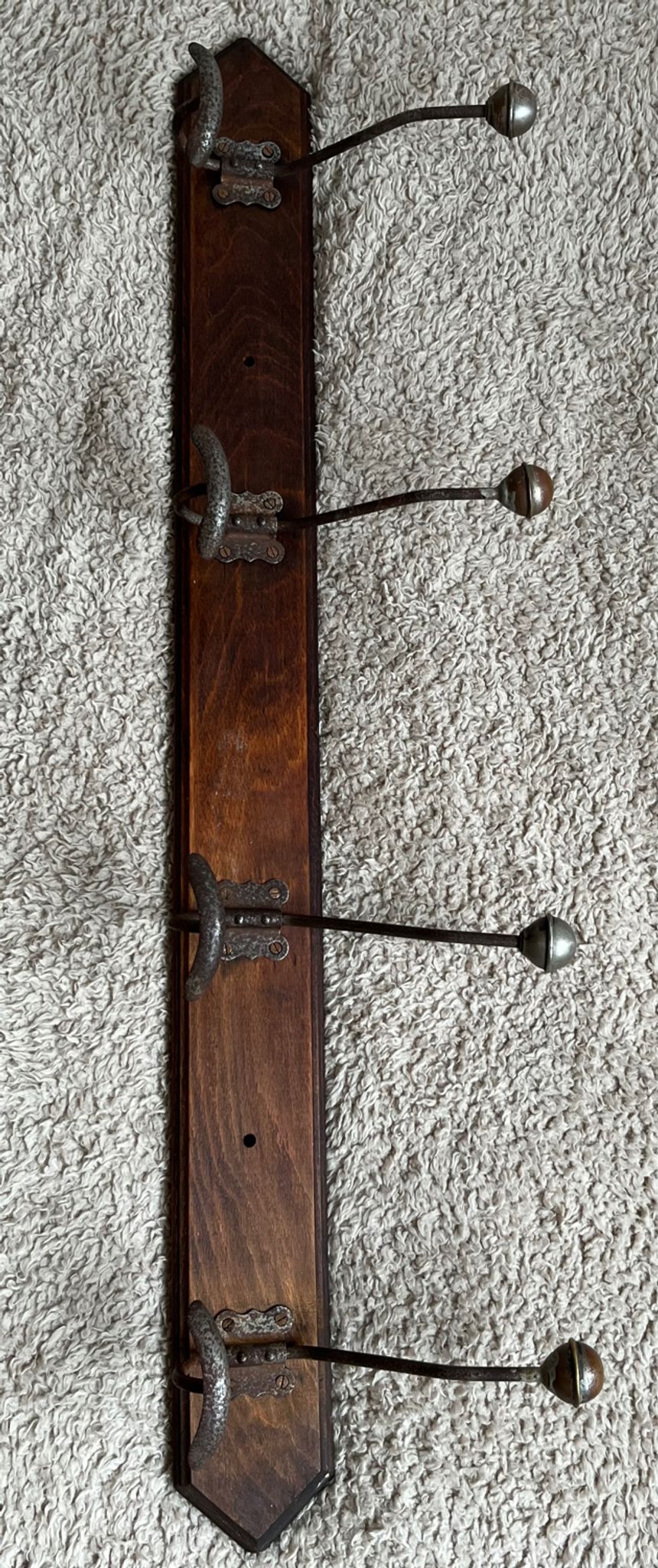 Old coat rack with metal/brass hooks
