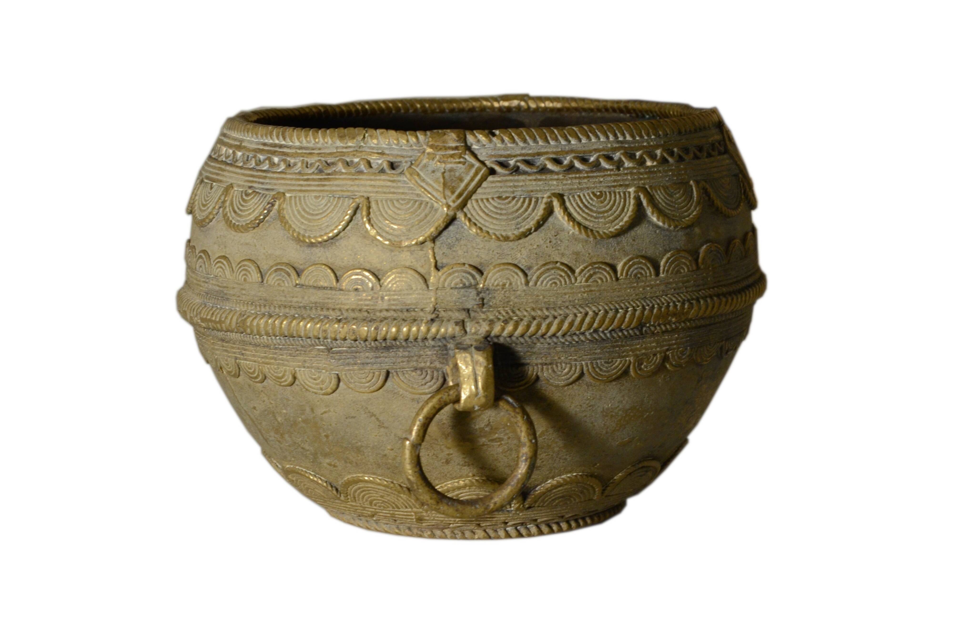 Ancient bronze ethnic pot, handcrafted in India.