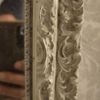 Carved mirror