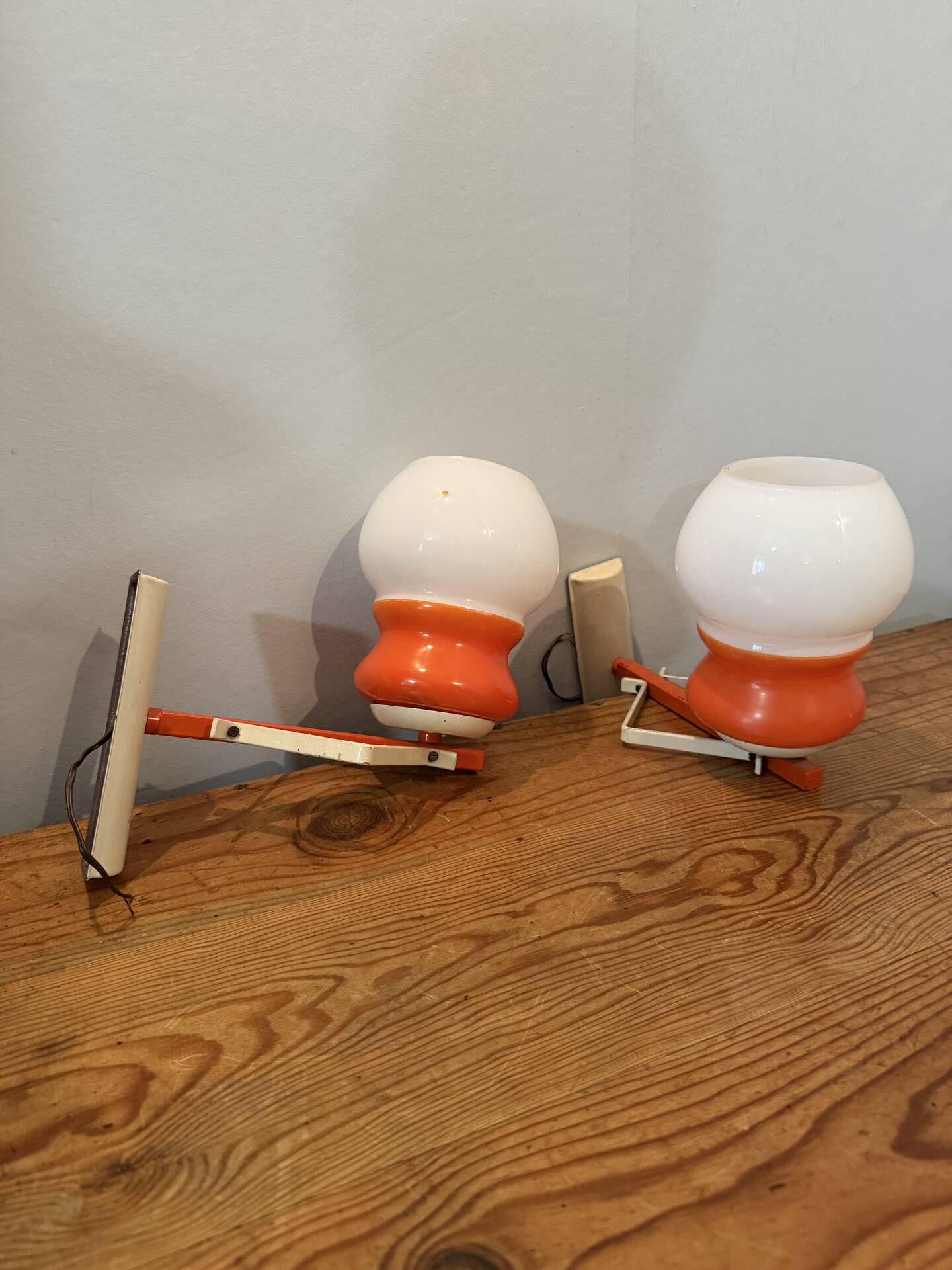 Pair of Space Age design wall lights in metal and vintage opaline.