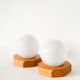 Pair of globe wall lights in opaline with a pine base, 1980.