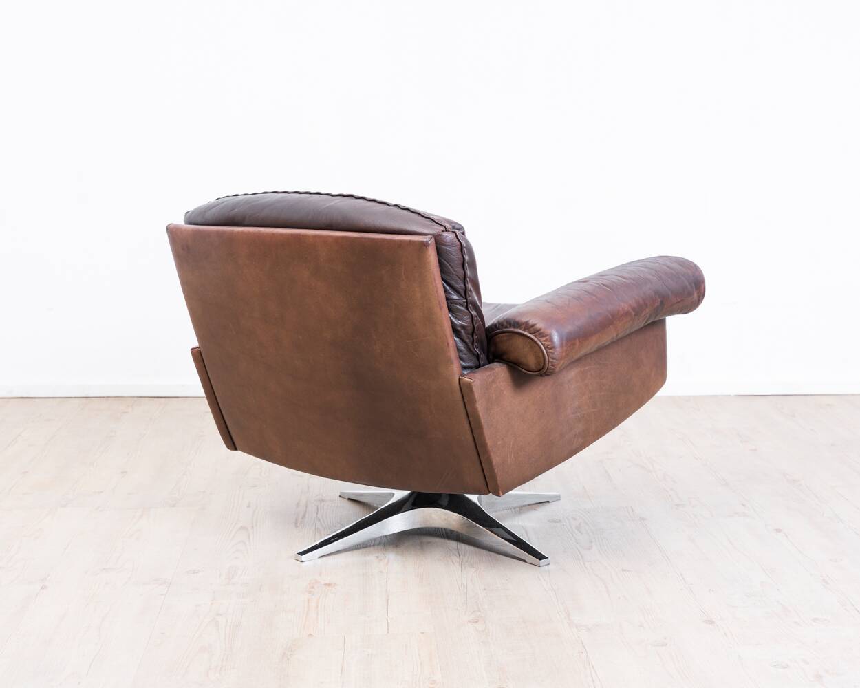 Brown leather swivel armchair by De Sede, model DS 31, 1960s, wine.