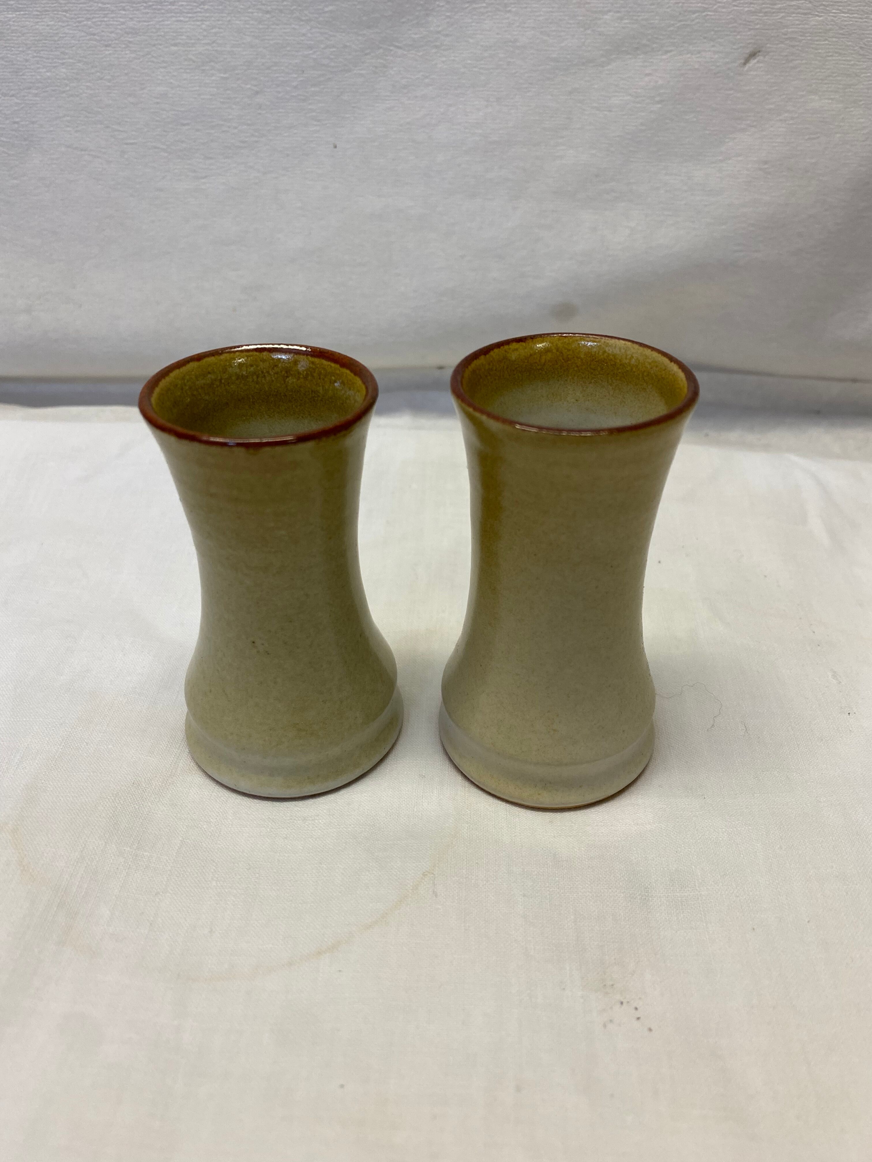 Pair of sandstone candle holders