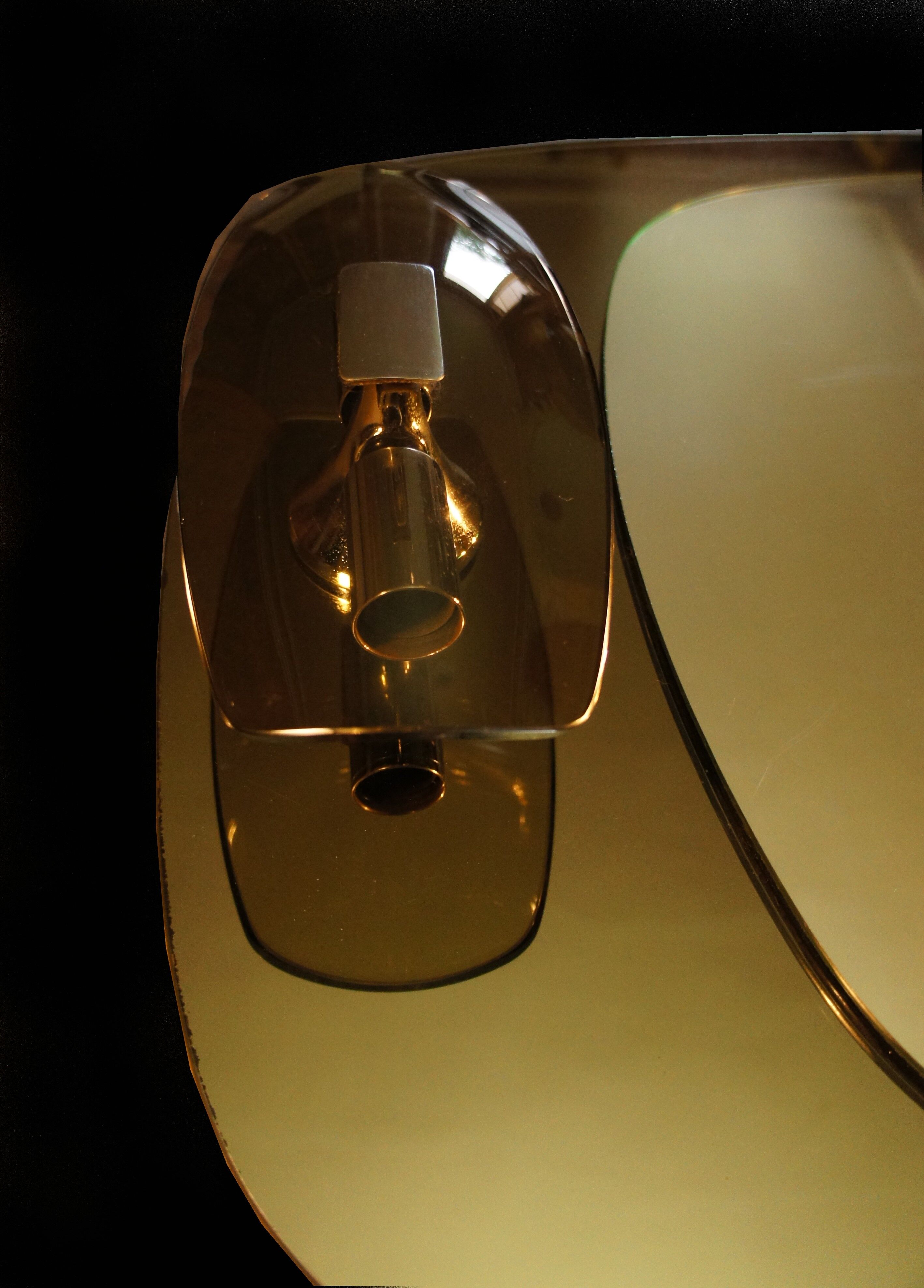 Light mirror in bronze tinted curved smoked glass