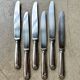 6 Christofle knives in silver-plated metal, shell design.