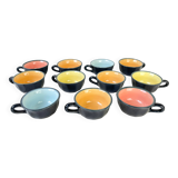 Vintage black earthenware coffee cups with multi-colored background, 1970s