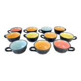 Vintage black earthenware coffee cups with multi-colored background, 1970s