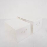 Set of two white plastic nesting tables