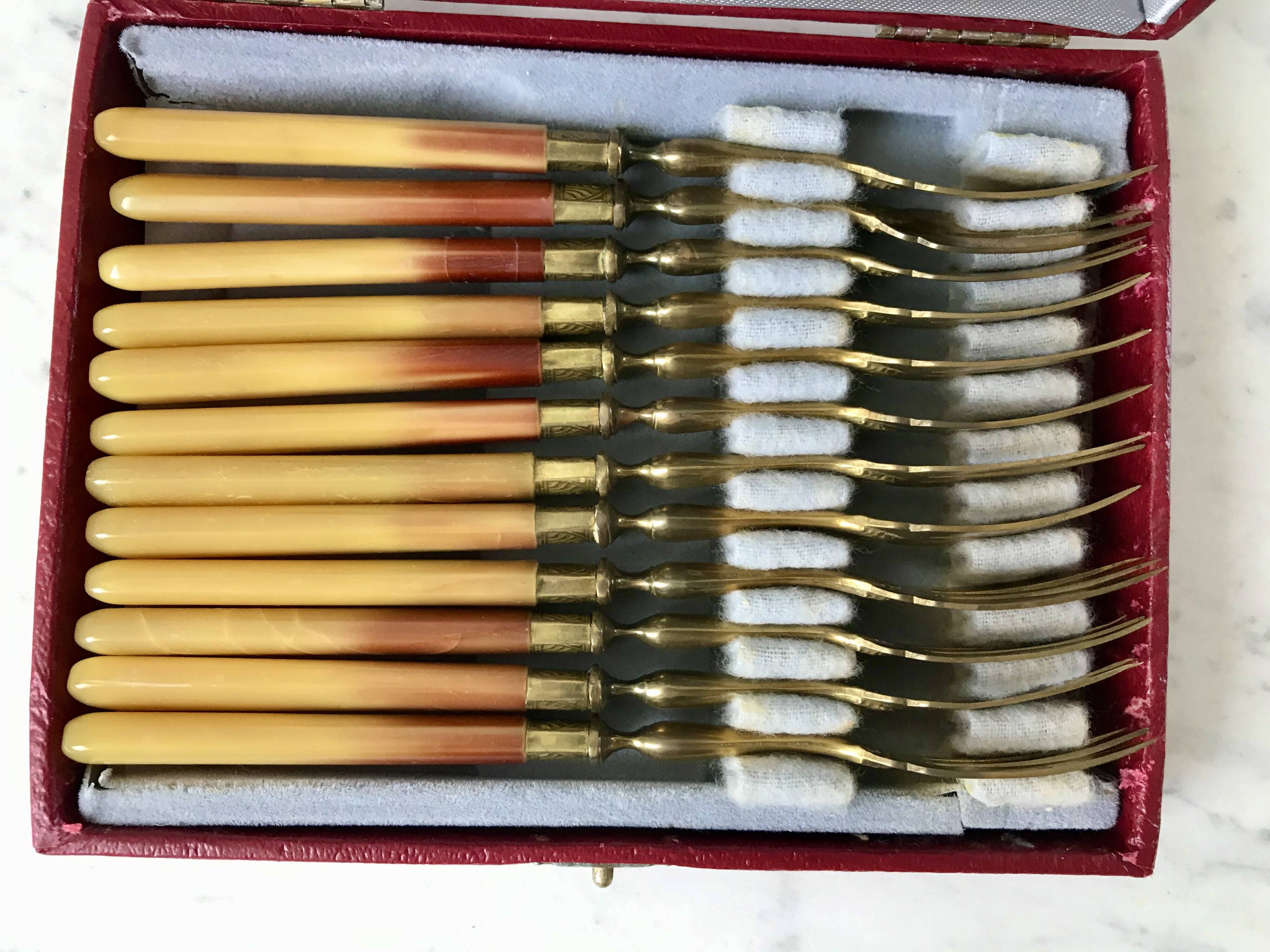set of 12 horn dessert forks from the 50s