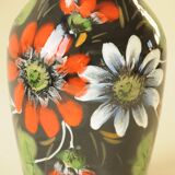Vintage black ceramic vase with painted floral decoration – stylised colourful flowers.