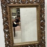 Napoleon III style mirror in carved wood, 20th century.