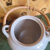 Teapot with flower and wooden handle