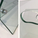Porte-revues design en verre et acier brossé