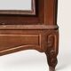 Louis XV style armoire with two bevelled mirror doors.