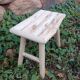 Small stool in raw wood