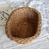 Vintage oval woven wicker basket with thick braided edge