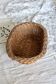 Vintage oval woven wicker basket with thick braided edge
