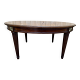 Oval dining table in Louis XVI style made of mahogany.