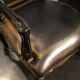 Lacquered and carved moulded wooden armchair