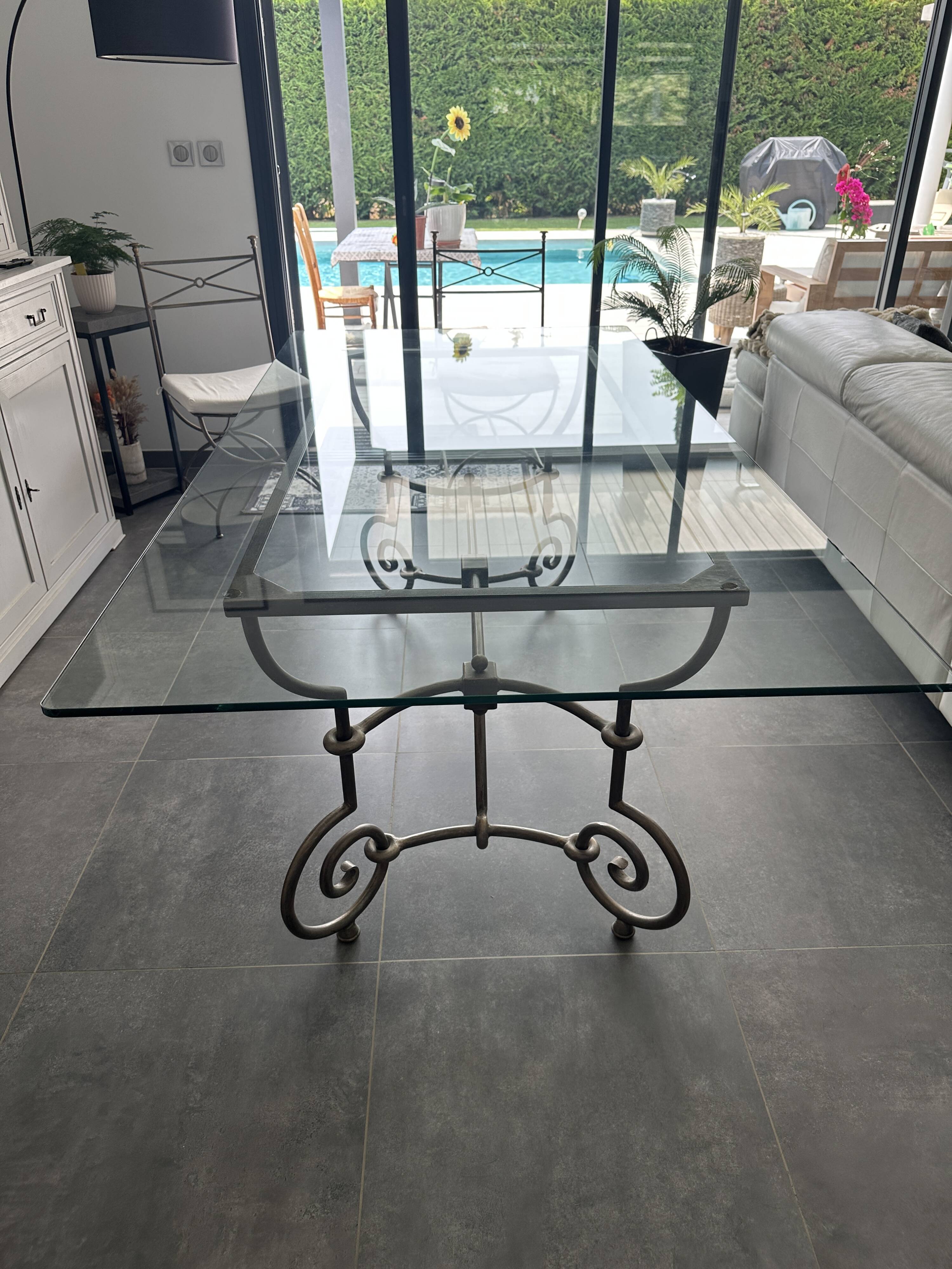 Roche Bobois glass and steel dining table and 6 chairs