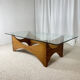 Sculptural coffee table in mahogany and glass – Europe, 1970s