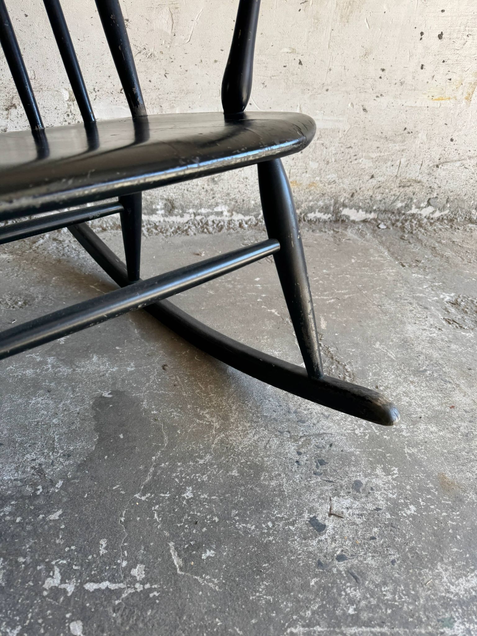 Black solid wood Scandinavian Windsor rocking chair — tall spindle back, mid-20th century