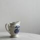 Porcelain sauce boat with blue pastoral pattern