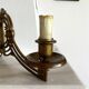 Art Nouveau style brass double piano wall lamp