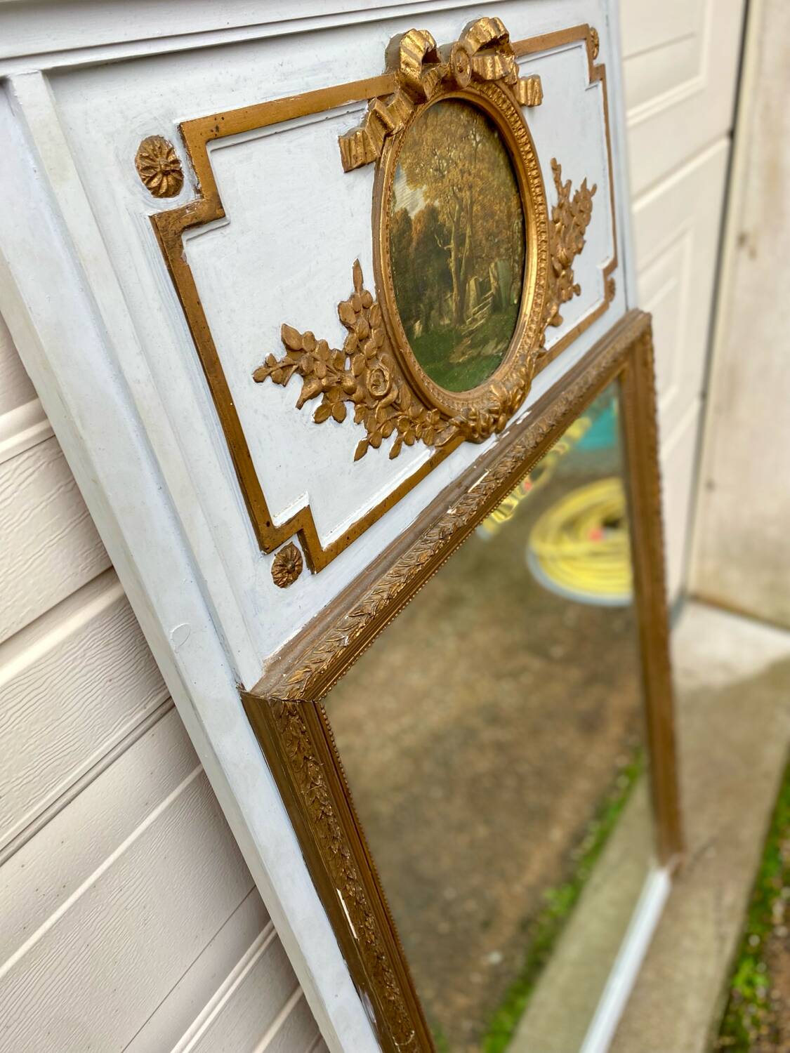 Trumeau mirror with oval decoration and wooden pediment 1920
