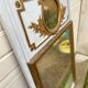 Trumeau mirror with oval decoration and wooden pediment 1920