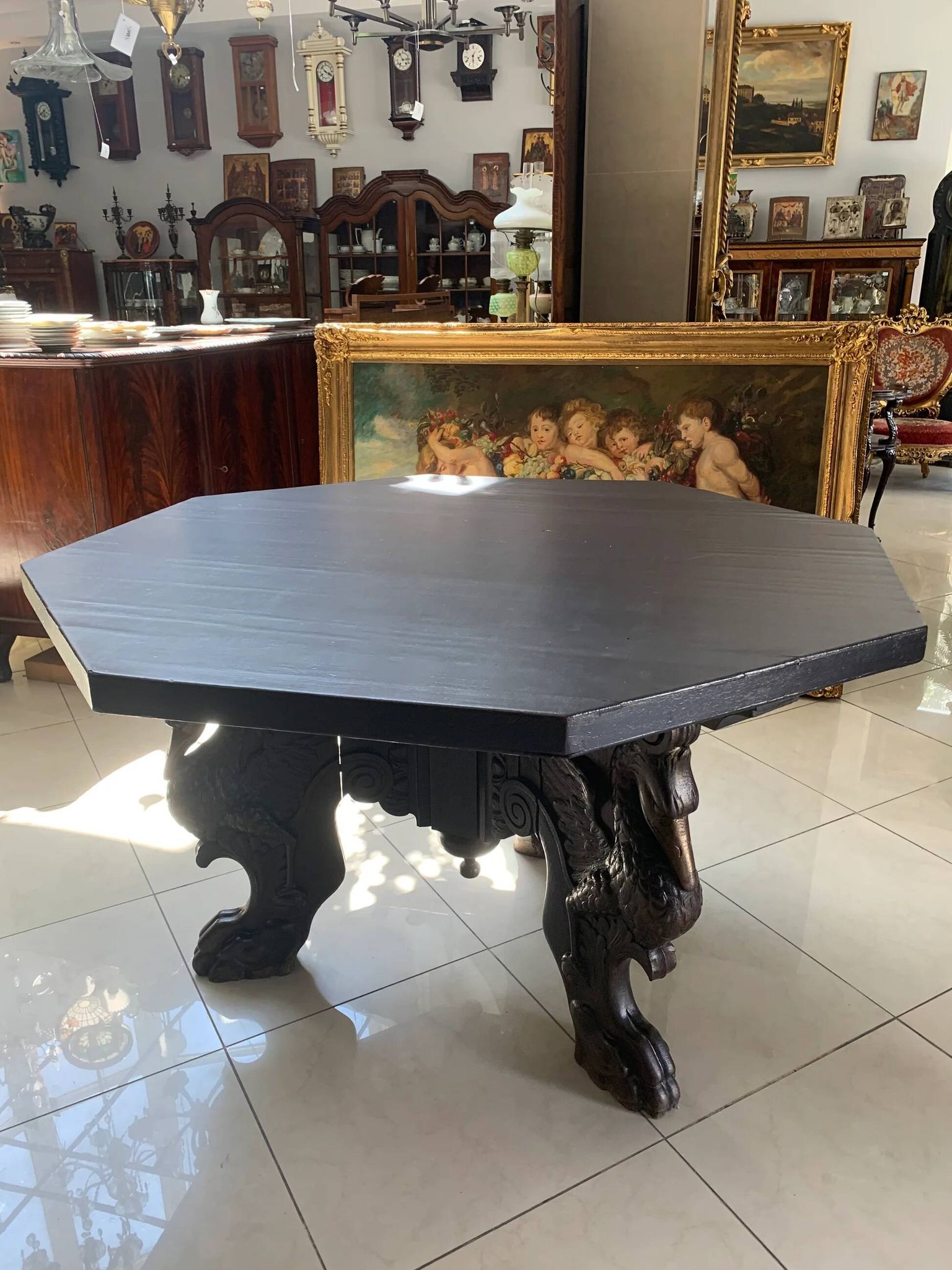 Octagonal oak table, 19th century, griffins