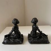 Art Nouveau spelter bookends, depicting an oriental woman, circa 1900