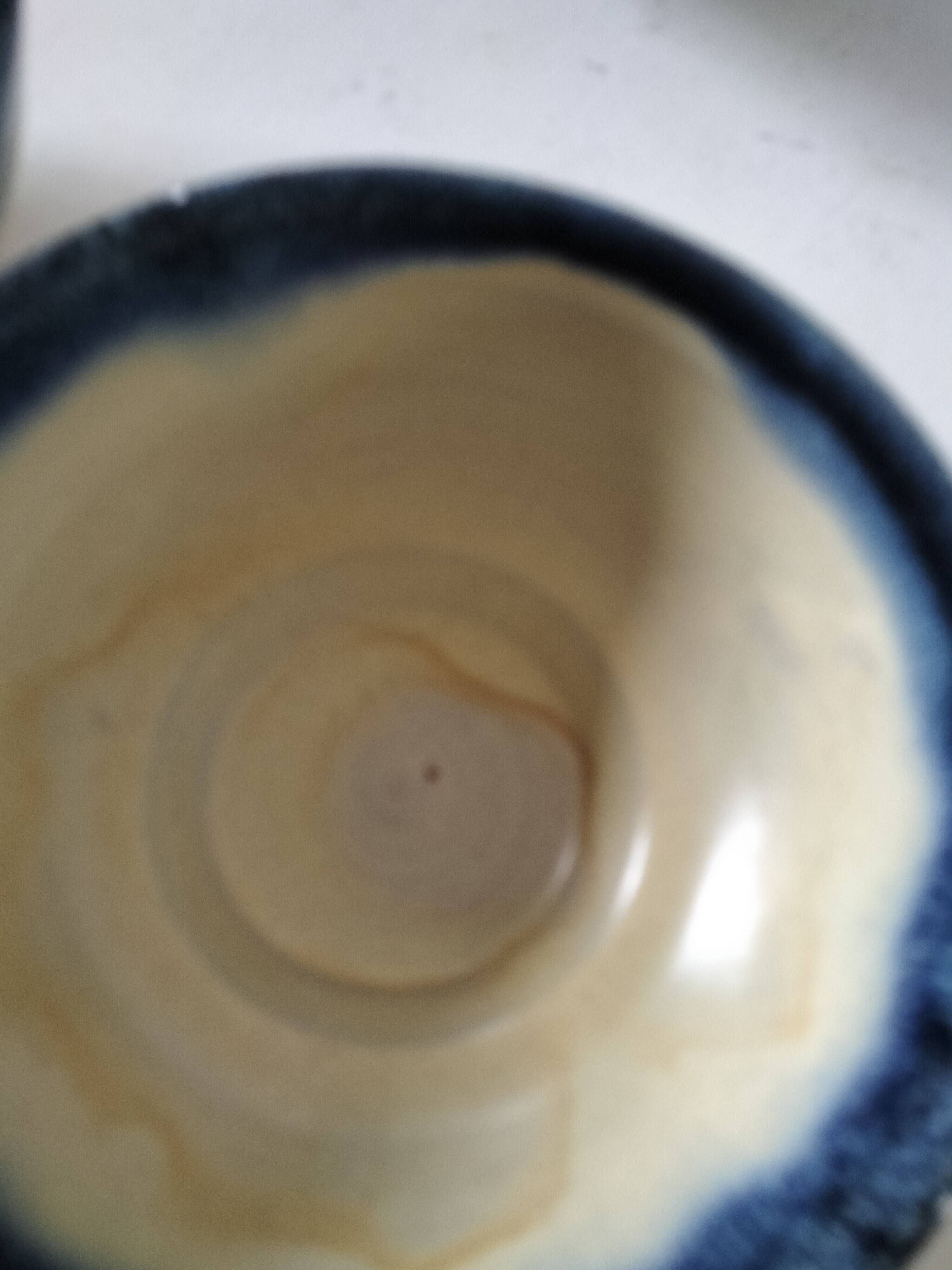 Set of 5 small blue and cream glazed stoneware bowls