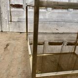 Square brass coffee table and smoked glasses