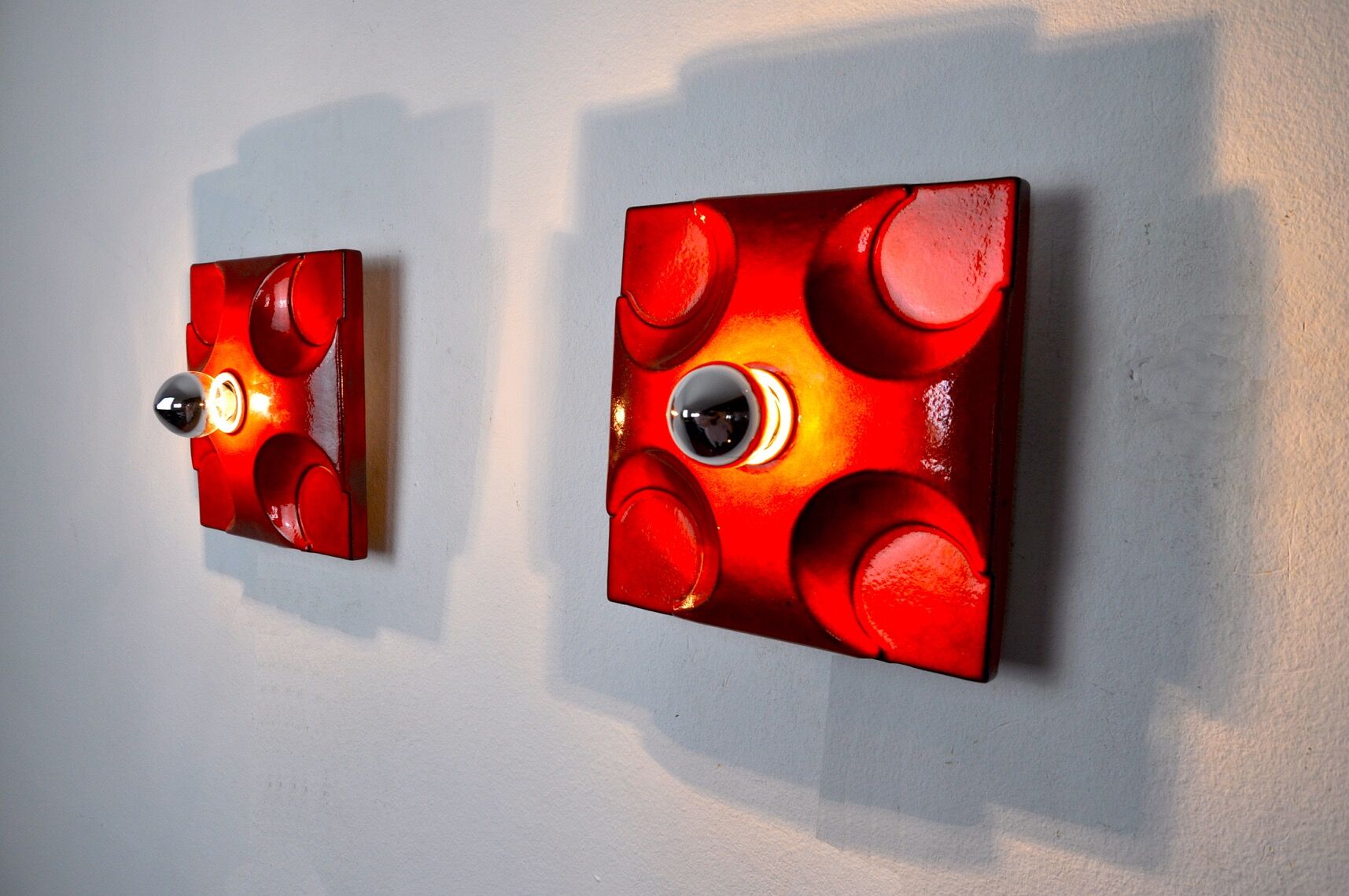 Pair of Fat Lava wall lamps by Hustadt Leuchten, Orange ceramic, Germany, 1960