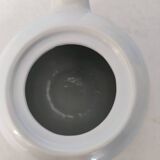 Small white porcelain teapot
