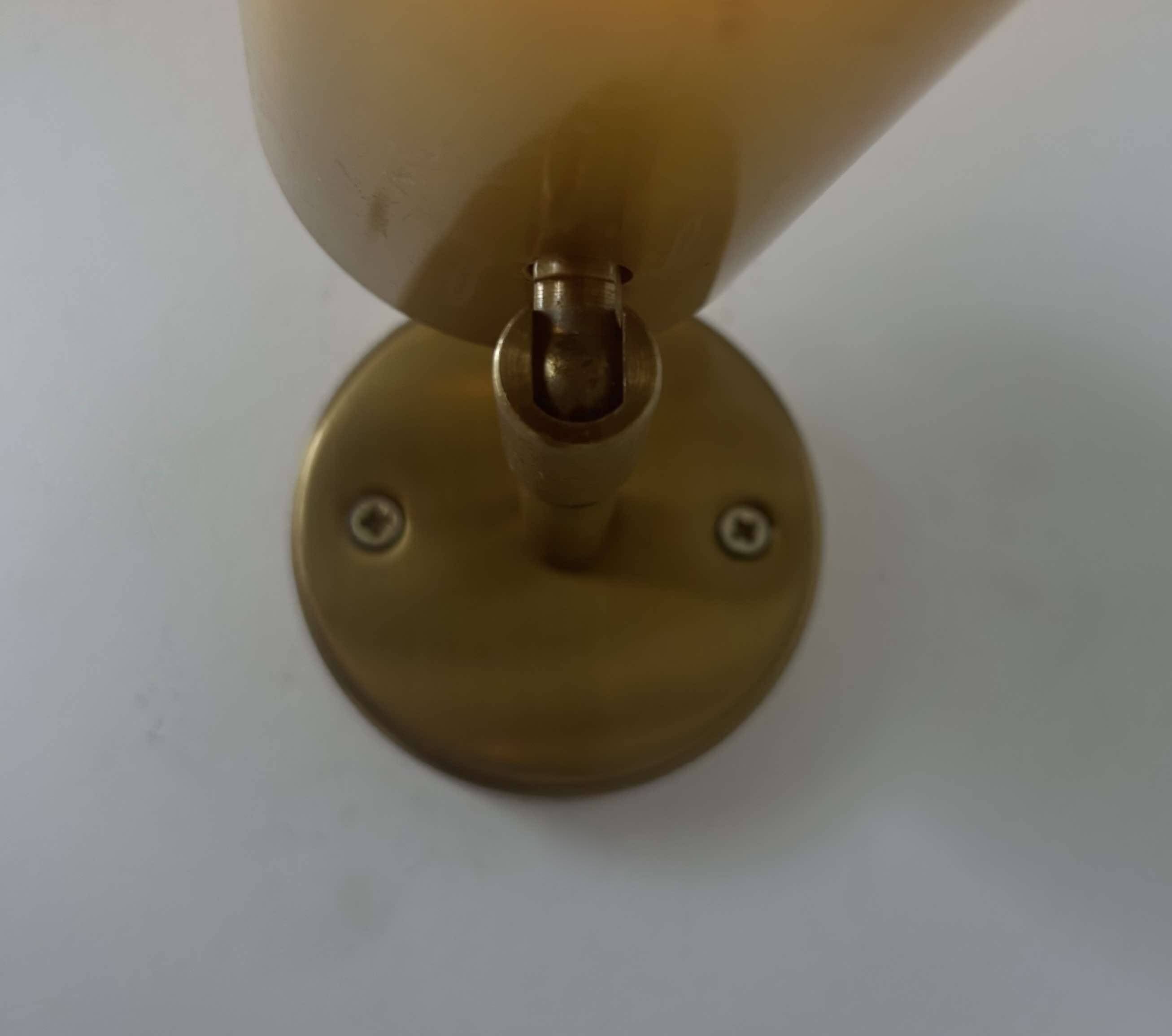 Vintage adjustable wall light, solid perforated brass, France 1960