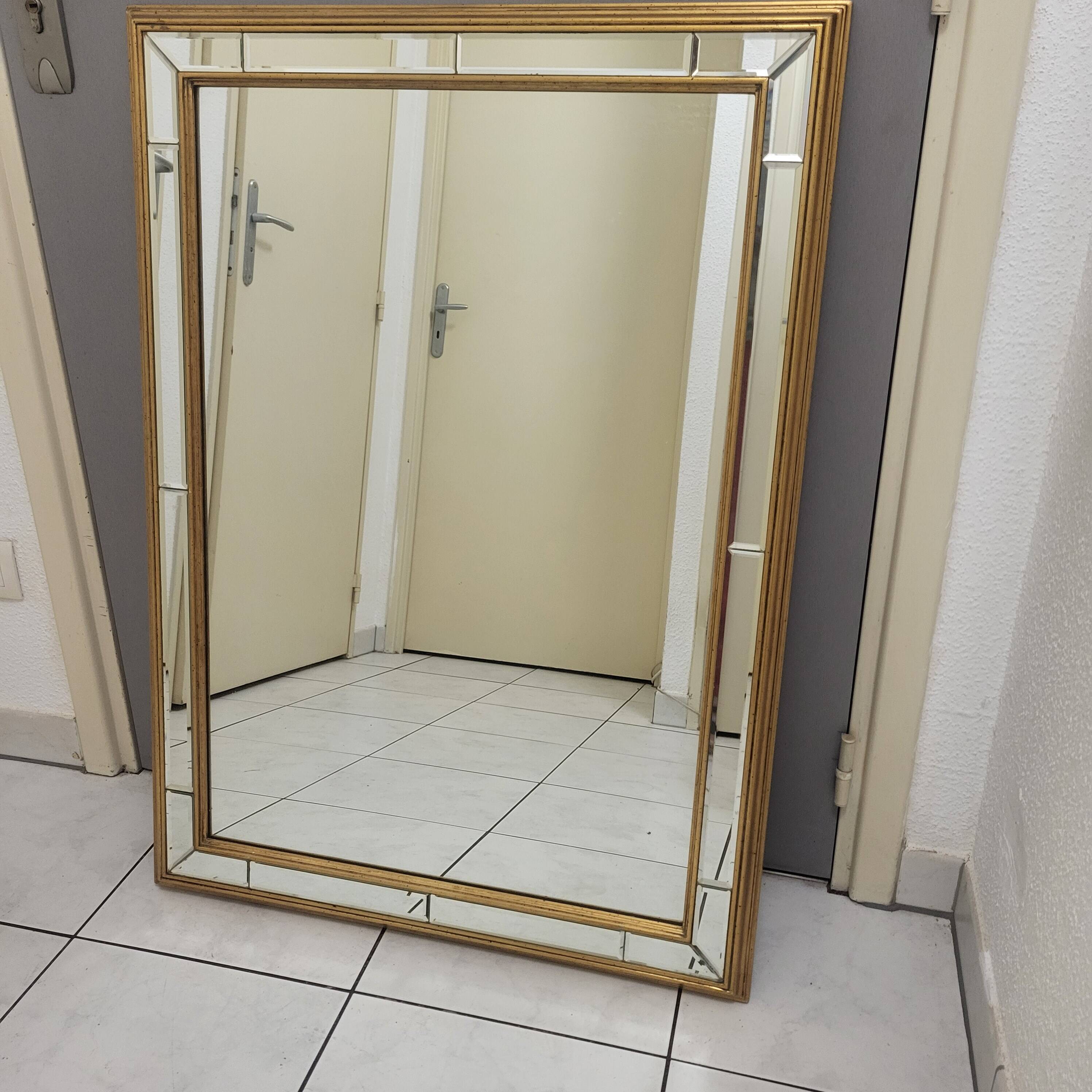 Bevelled and gold mirror with a frame by DeKnudt, Belgium 1960-70.