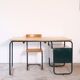 Desk with bauhaus style tubular steel chair
