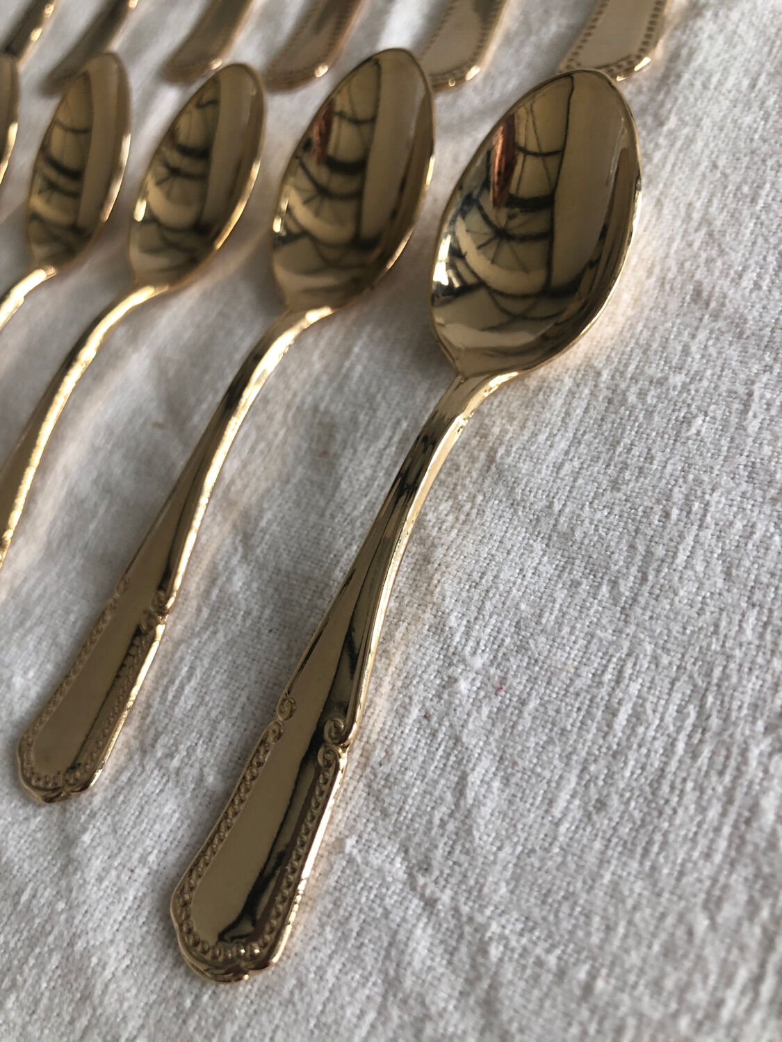 12 small teaspoons in Vintage golden metal